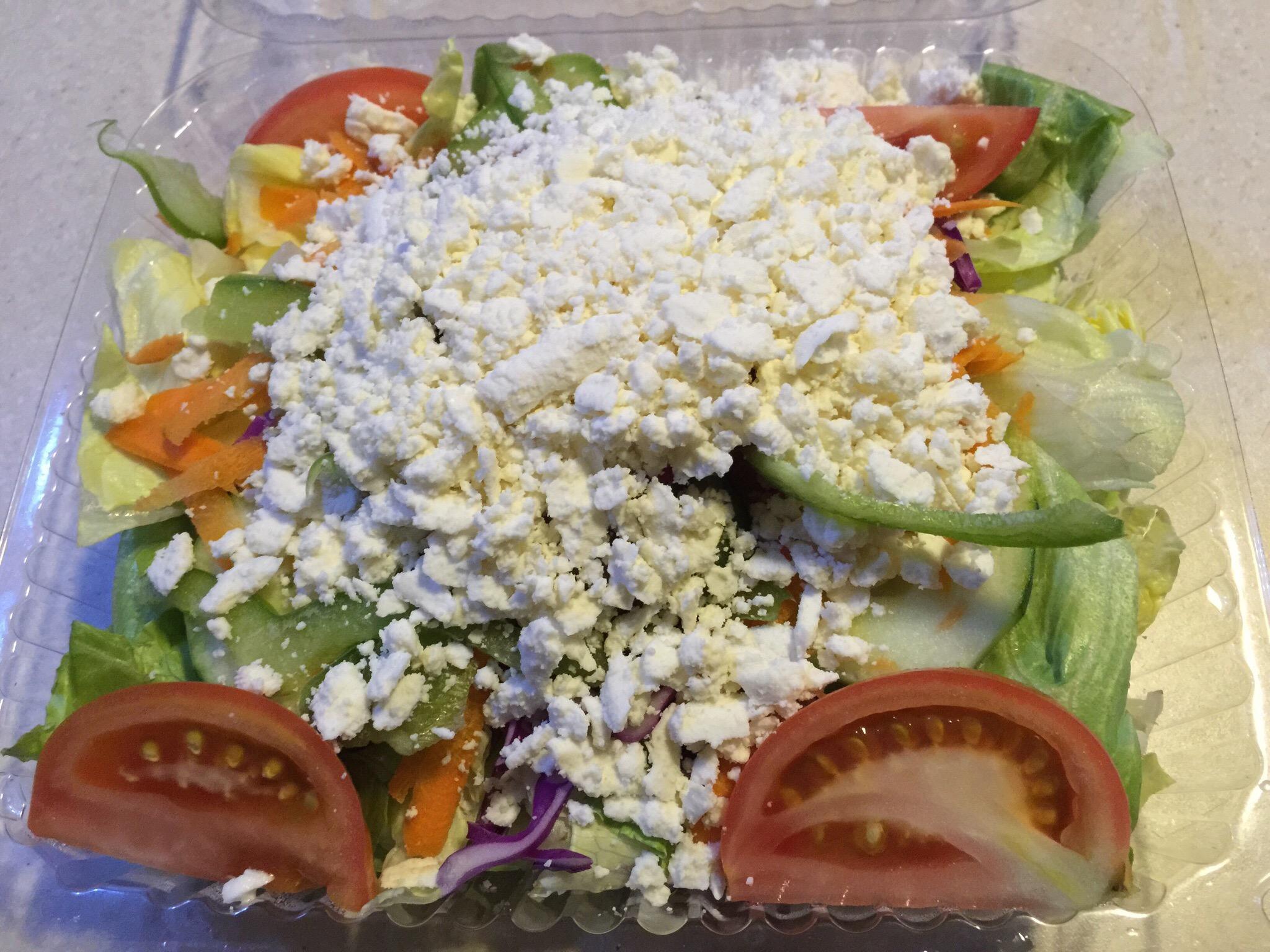 Greek salad with feta, olives and vegetables from Epsom House of Pizza